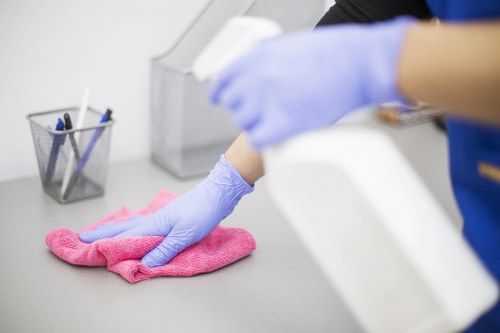 Office cleaners working in a Hammersmith commercial building reception area