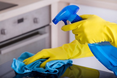 Post builders cleaning in a Hammersmith home after renovation