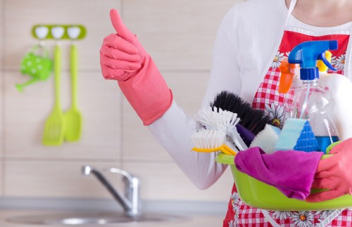 Carpet cleaning team preparing safely in a Hammersmith property