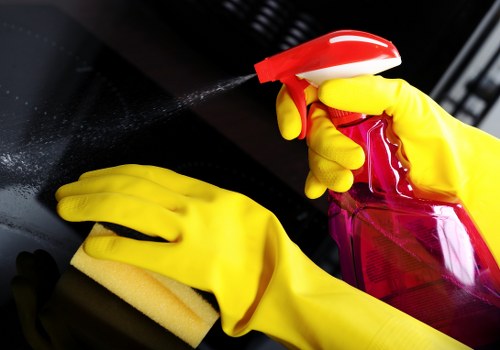 Cleaner maintaining a washroom and communal area in a Hammersmith premises
