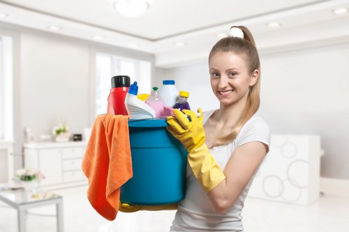 Local short-let cleaner preparing a furnished apartment in Hammersmith